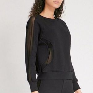 Good American black sweatshirt mesh inset cutouts. Long sleeve women’s size S